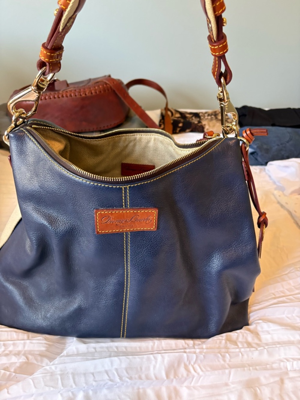 Dooney & Bourke Navy Leather Shoulder Bag with Brown Trim and Gold Hardware